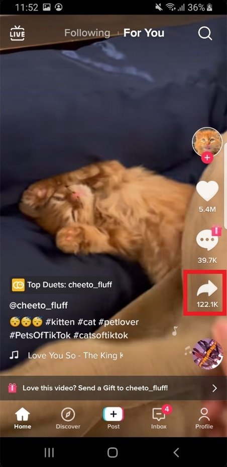 When you find a video on TikTok that interests you, click the arrow on the right